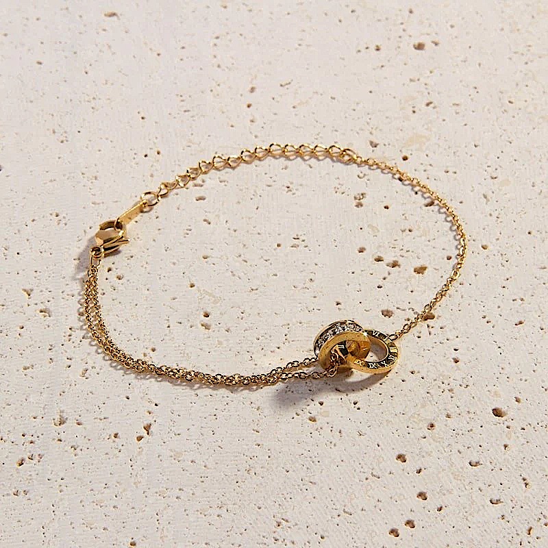 18k Yellow Gold Plated Roman Numeral And Pave Crystal Interlocking Circle 18k Yellow Gold Plated Roman Numeral And Pave Crystal Interlocking Circle